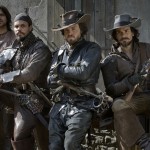 The Musketeers Cast: D'Artagnan (LUKE PASQUALINO), Porthos (HOWARD CHARLES), Athos (TOM BURKE) and Aramis (SANTIAGO CABRERA) - Image Credit: BBC/Dusan Martincek
